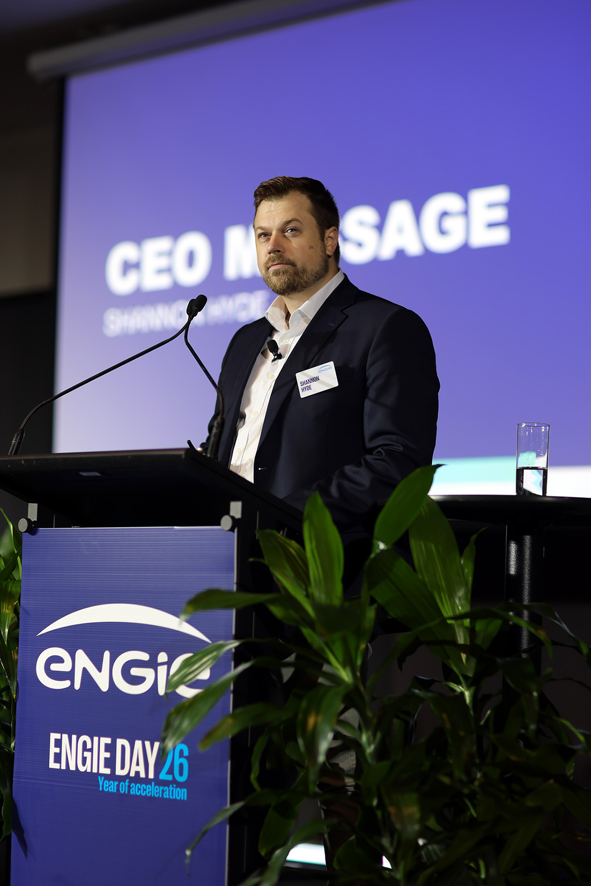 ENGIE executive presenting from a branded Melbourne conference stage