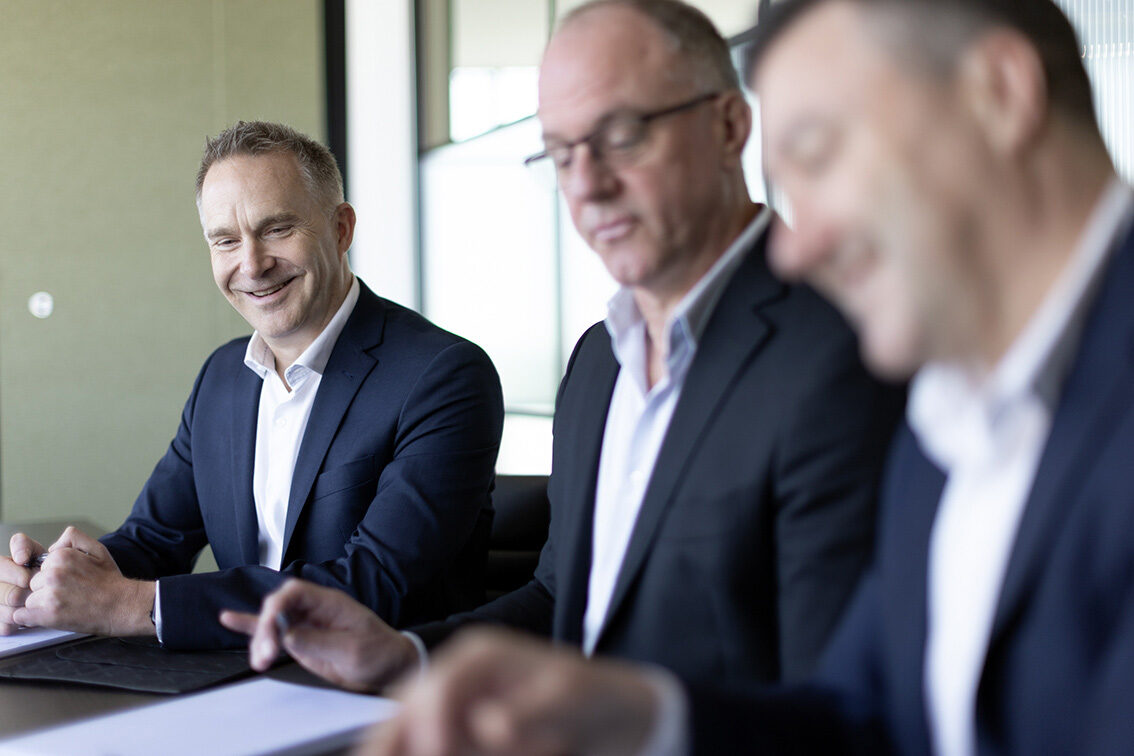 Team meeting photographed in a Melbourne workplace
