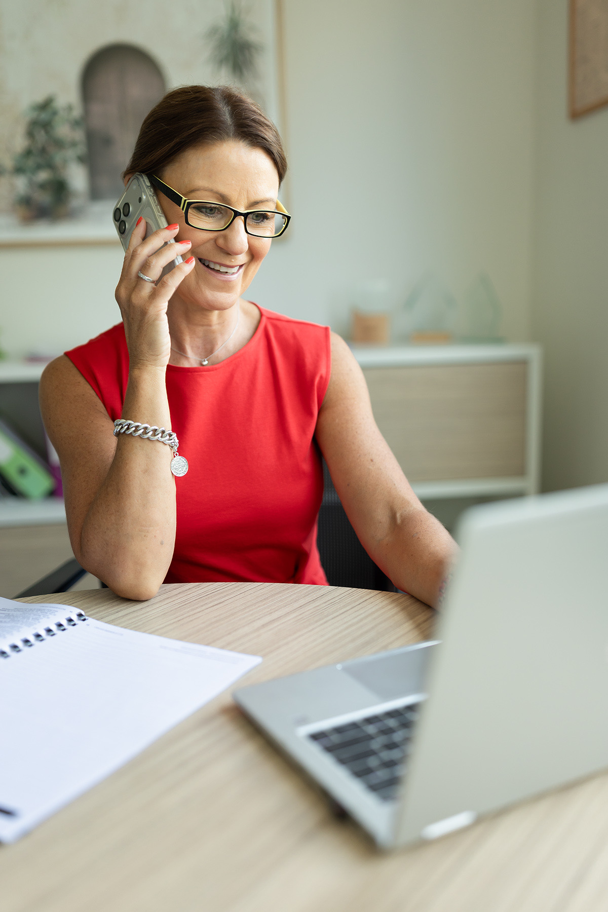 Business professional working on a laptop at a desk