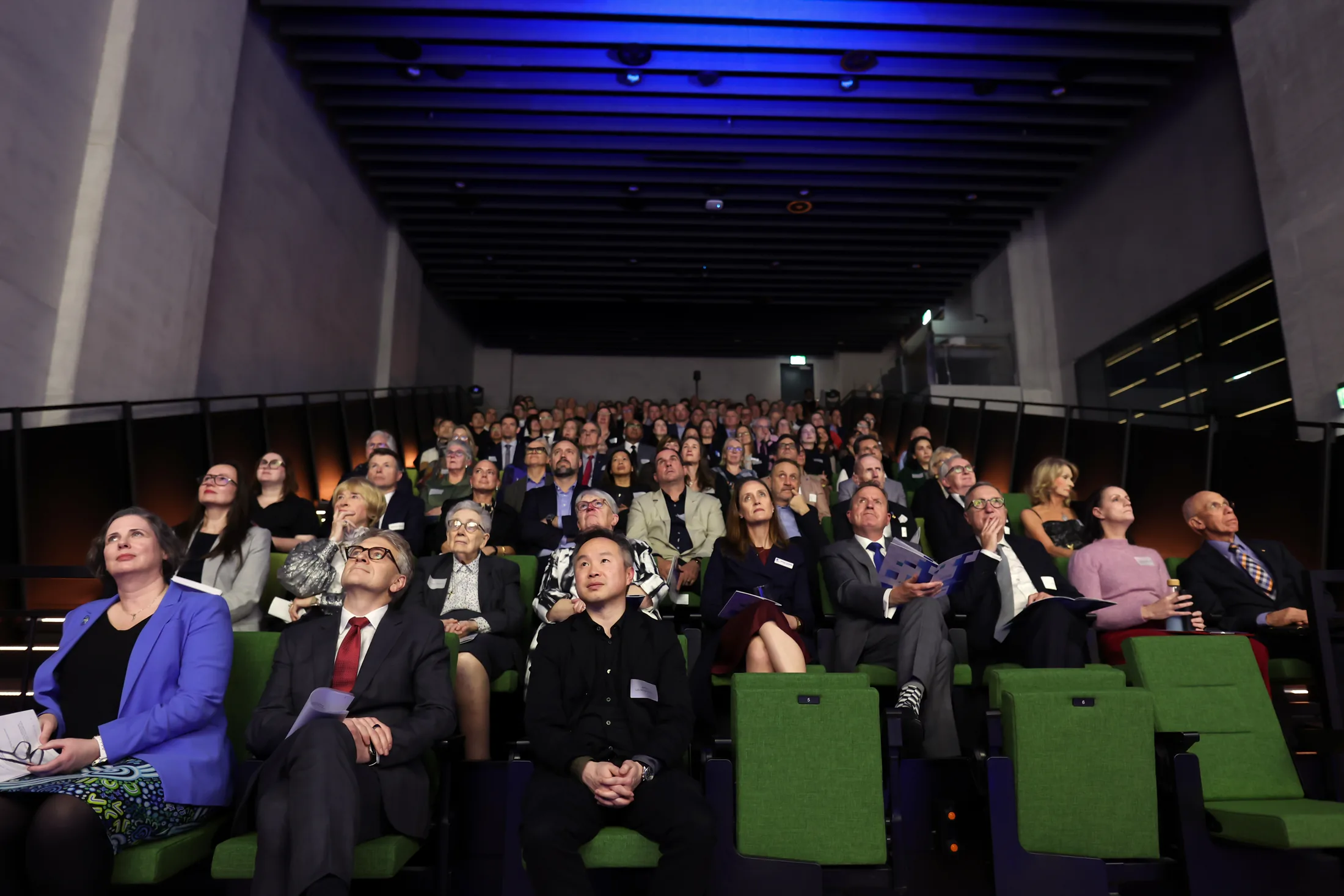 Audience watching a presentation at a Melbourne business event