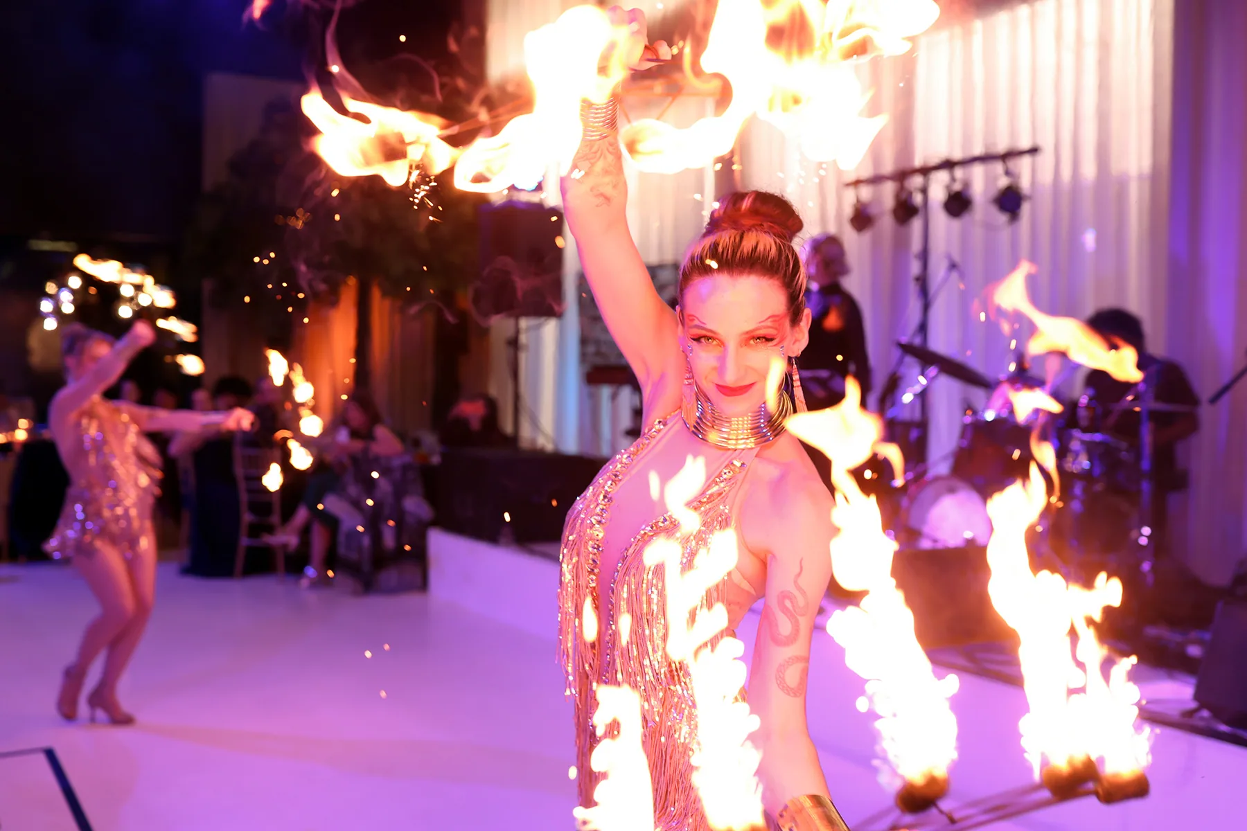 Fire performer entertaining guests at a Melbourne gala dinner